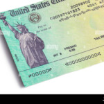 Federal Tax Refund Check Close Up Cut Out On White Stock Photo Alamy