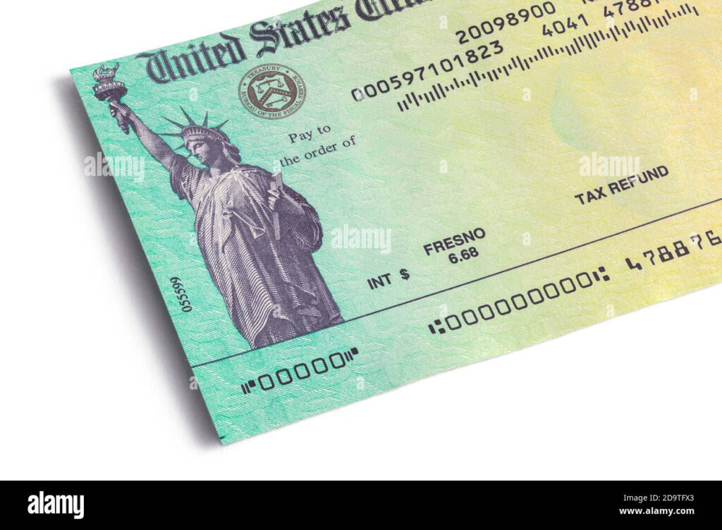 Federal Tax Refund Check Close Up Cut Out On White Stock Photo Alamy