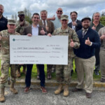 JBLM Presented With 1 6 Million Energy Saving Rebate Check Article